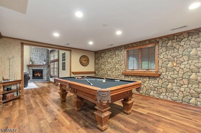 114 Fawn Ridge Dr, Long Hill Twp, NJ 07946 - playroom with ornamental molding, a stone fireplace, wood finished floors, billiards table, and recessed lighting