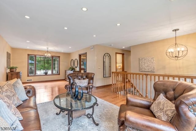 114 Fawn Ridge Dr, Long Hill Twp, NJ 07946 - living area with a chandelier, light wood-style flooring, and recessed lighting