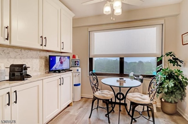 2 Claridge Dr Unit 7Lw, Verona Twp, NJ 07044 - dining space with light wood finished floors and a ceiling fan