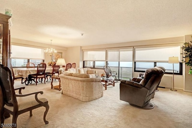 2 Claridge Dr Unit 7Lw, Verona Twp, NJ 07044 - living room featuring a textured ceiling, light carpet, and a chandelier