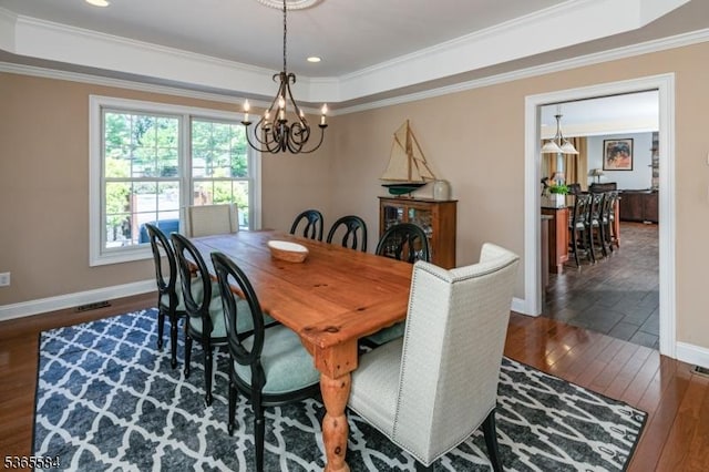 4 Wingover Farm Ct, Raritan Twp, NJ 08822 - dining space featuring wood-type flooring, a chandelier, ornamental molding, a tray ceiling, and recessed lighting