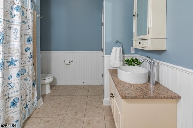4 Wingover Farm Ct, Raritan Twp, NJ 08822 - bathroom featuring a wainscoted wall, vanity, tile patterned floors, and a shower with shower curtain