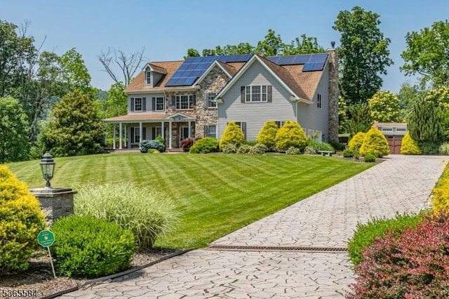 4 Wingover Farm Ct, Raritan Twp, NJ 08822 - view of front of property featuring covered porch, stone siding, a front lawn, and solar panels