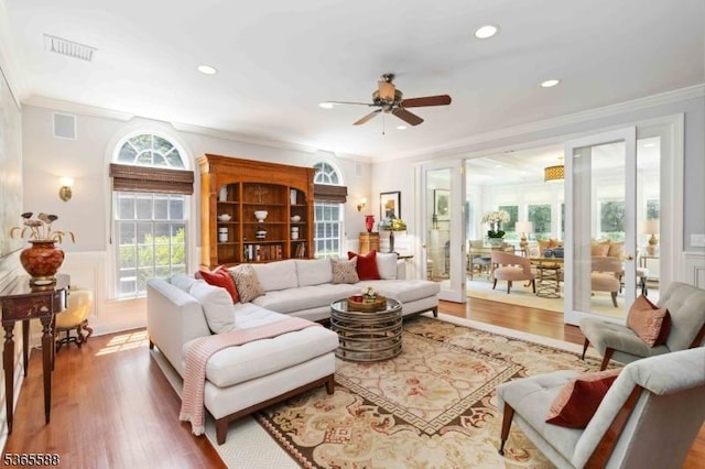 10 Westminster Pl, Morris Twp, NJ 07960 - living room with ceiling fan, wood finished floors, crown molding, recessed lighting, and a wainscoted wall
