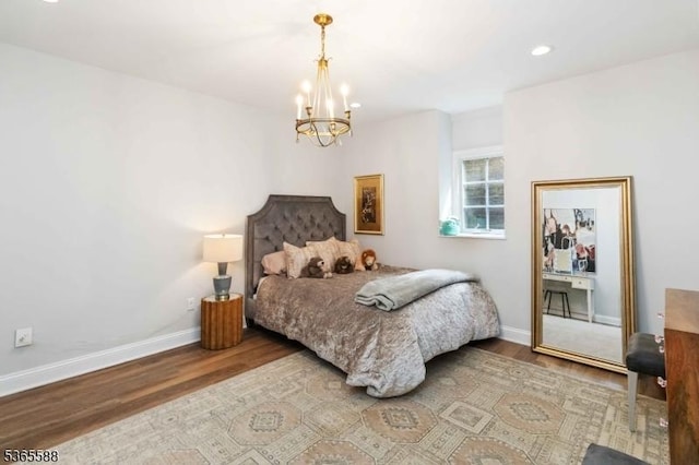 10 Westminster Pl, Morris Twp, NJ 07960 - bedroom with a chandelier, wood finished floors, and recessed lighting