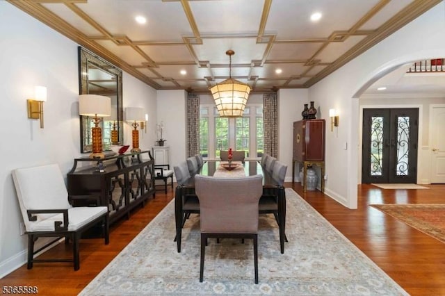 10 Westminster Pl, Morris Twp, NJ 07960 - dining area featuring arched walkways, french doors, wood finished floors, crown molding, and recessed lighting