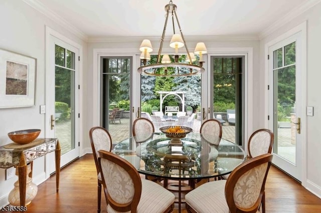 10 Westminster Pl, Morris Twp, NJ 07960 - dining space with a chandelier, healthy amount of natural light, crown molding, and wood finished floors