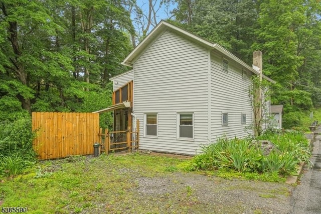 130 Ackerson Rd, Frelinghuysen Twp, NJ 07825 - view of side of home with a chimney