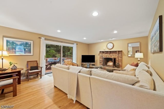 10 Kilmer Dr, Hillsborough Twp, NJ 08844 - living area featuring light wood-style flooring, a fireplace, and recessed lighting