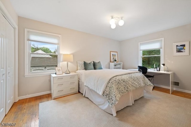 10 Kilmer Dr, Hillsborough Twp, NJ 08844 - bedroom featuring light wood finished floors, a closet, and an office area