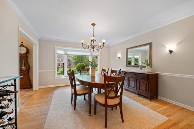 10 Kilmer Dr, Hillsborough Twp, NJ 08844 - dining room with a chandelier, crown molding, and light wood finished floors