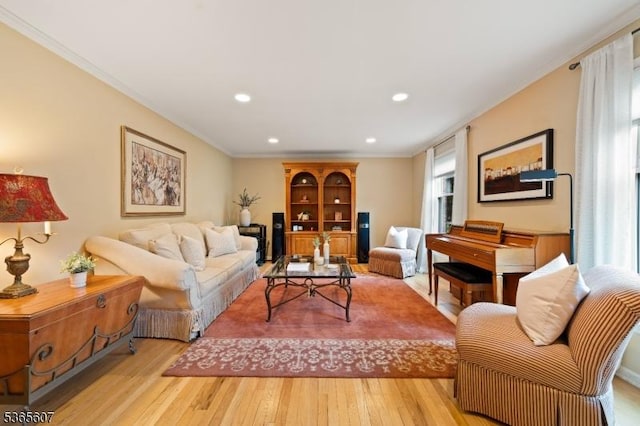 10 Kilmer Dr, Hillsborough Twp, NJ 08844 - living area featuring light wood finished floors, crown molding, and recessed lighting