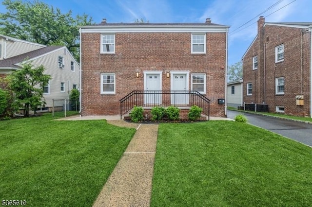 1489 Morris Ave, Union Twp, NJ 07083 - view of front of home featuring brick siding and a front yard