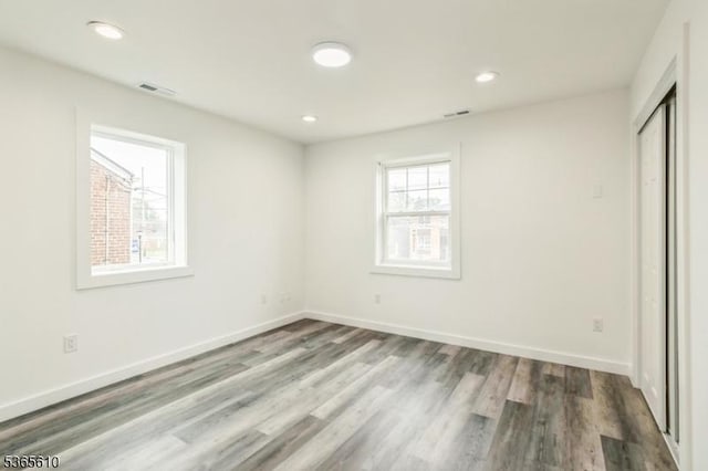 1489 Morris Ave, Union Twp, NJ 07083 - unfurnished bedroom featuring wood finished floors, recessed lighting, and a closet
