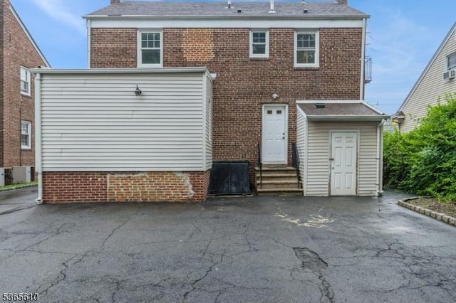 1489 Morris Ave, Union Twp, NJ 07083 - back of house featuring entry steps and a chimney