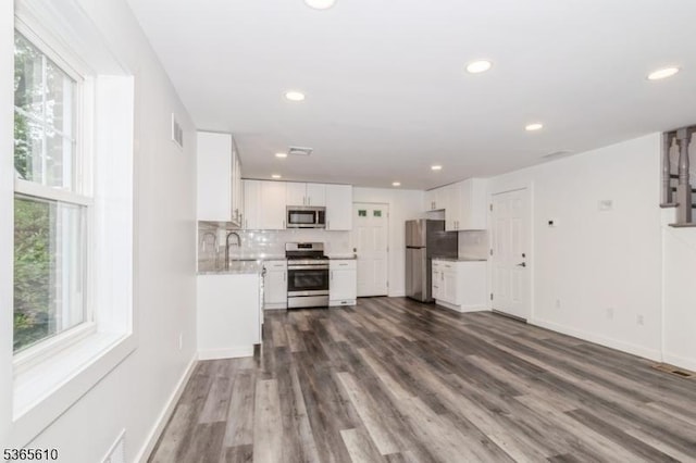 1489 Morris Ave, Union Twp, NJ 07083 - unfurnished living room with recessed lighting and dark wood-style floors