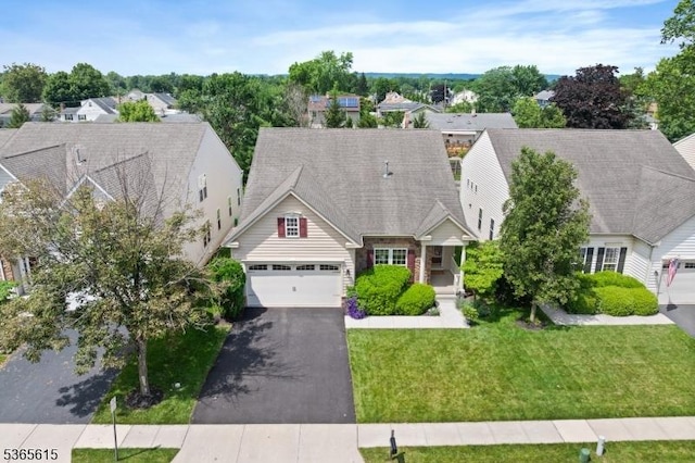 7 Thornton St, Hillsborough Twp, NJ 08844 - cape cod home with driveway, a garage, a front yard, and a residential view