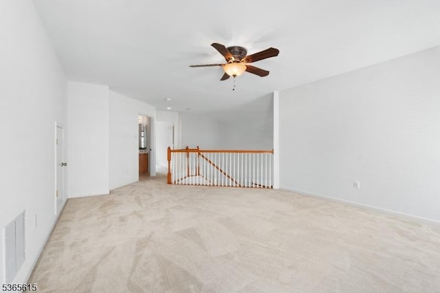 7 Thornton St, Hillsborough Twp, NJ 08844 - spare room featuring ceiling fan and light colored carpet