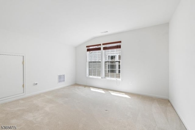 7 Thornton St, Hillsborough Twp, NJ 08844 - empty room with vaulted ceiling and carpet flooring