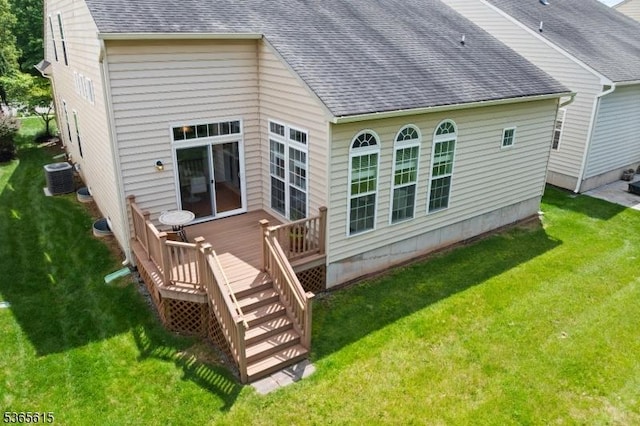 7 Thornton St, Hillsborough Twp, NJ 08844 - rear view of house featuring a shingled roof, a deck, and a lawn