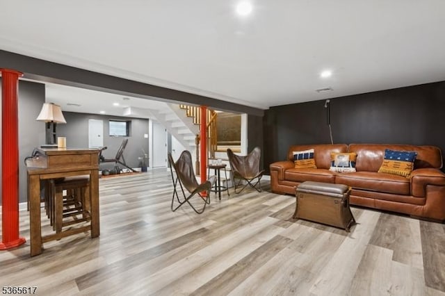 17 Lowell Ave, West Orange Twp, NJ 07052 - living area featuring stairway, light wood-type flooring, recessed lighting, and ornate columns