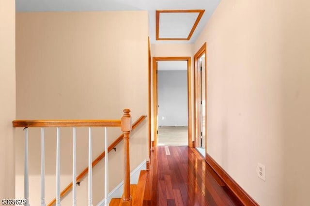 1265 Iris St, North Brunswick Twp, NJ 08902 - corridor featuring an upstairs landing, wood finished floors, and attic access