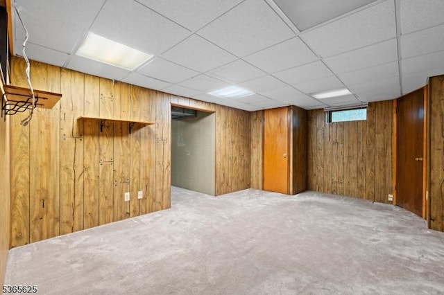1265 Iris St, North Brunswick Twp, NJ 08902 - basement with wooden walls, carpet floors, and a paneled ceiling