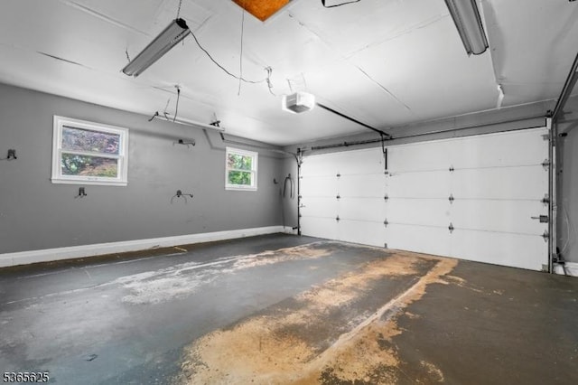 1265 Iris St, North Brunswick Twp, NJ 08902 - garage with a garage door opener and baseboards
