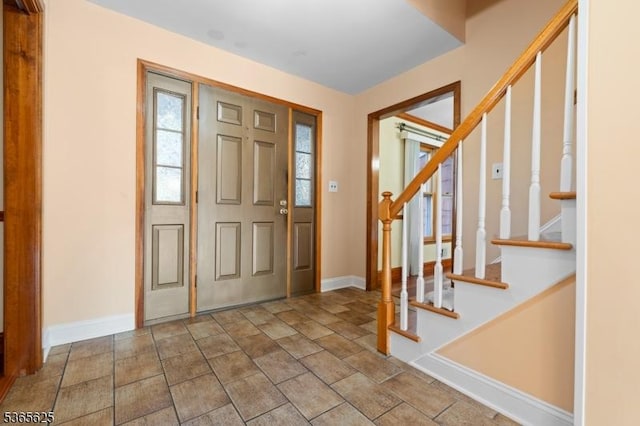 1265 Iris St, North Brunswick Twp, NJ 08902 - foyer featuring stone finish floors and stairs