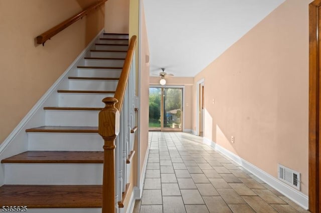 1265 Iris St, North Brunswick Twp, NJ 08902 - staircase with baseboards and a ceiling fan