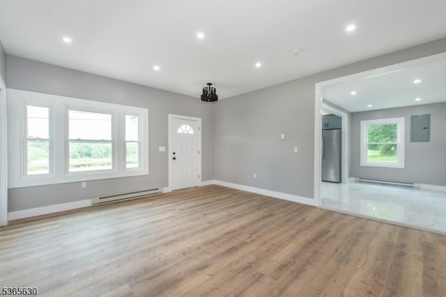 612 State Route 94, Fredon Twp, NJ 07860 - foyer entrance with a baseboard heating unit, electric panel, light wood-style floors, and recessed lighting