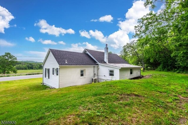 612 State Route 94, Fredon Twp, NJ 07860 - rear view of property featuring a lawn and roof with shingles