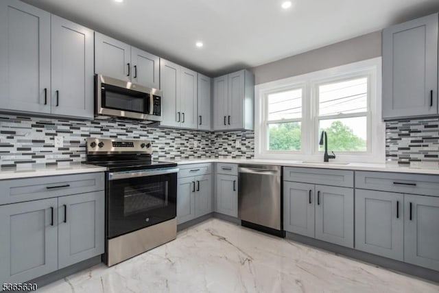 612 State Route 94, Fredon Twp, NJ 07860 - kitchen featuring appliances with stainless steel finishes, light marble finish floors, gray cabinets, and recessed lighting
