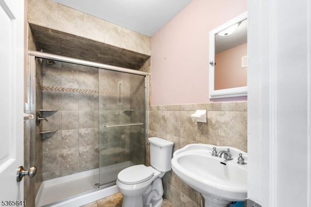 9 Village Ct, Flemington Boro, NJ 08822 - bathroom with a shower stall, tile walls, and a wainscoted wall
