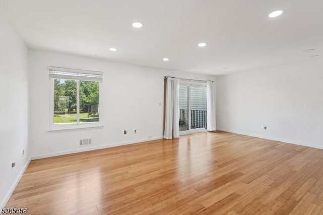 922C Merritt Dr, Hillsborough Twp, NJ 08844 - empty room with recessed lighting and light wood finished floors