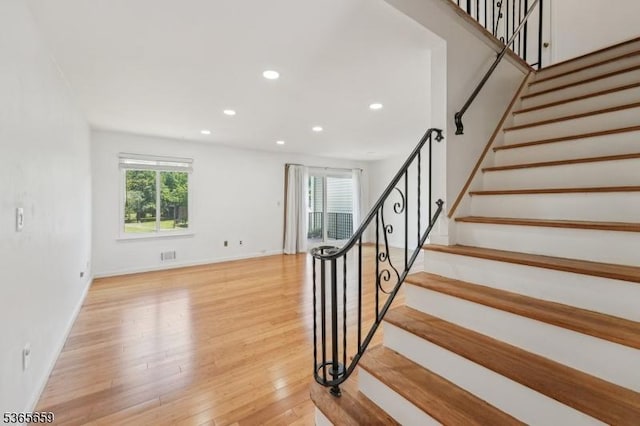 922C Merritt Dr, Hillsborough Twp, NJ 08844 - staircase with healthy amount of natural light, wood finished floors, and recessed lighting