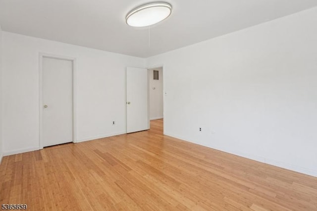 922C Merritt Dr, Hillsborough Twp, NJ 08844 - empty room featuring light wood finished floors