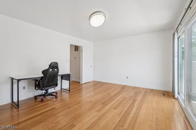 922C Merritt Dr, Hillsborough Twp, NJ 08844 - office area featuring light wood finished floors and baseboards
