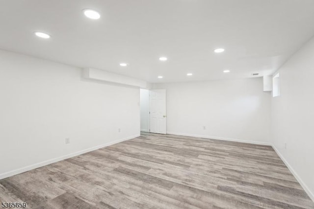 922C Merritt Dr, Hillsborough Twp, NJ 08844 - finished basement featuring recessed lighting and wood finished floors