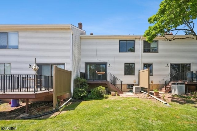 922C Merritt Dr, Hillsborough Twp, NJ 08844 - rear view of property with stairway, a lawn, and a deck