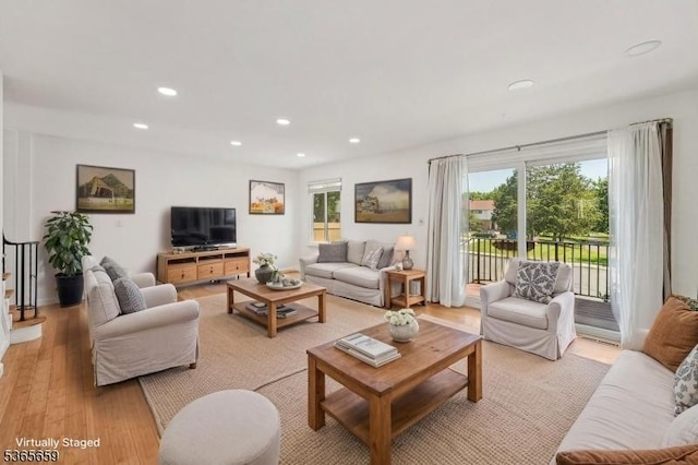 922C Merritt Dr, Hillsborough Twp, NJ 08844 - living area featuring light wood-type flooring, healthy amount of natural light, and recessed lighting