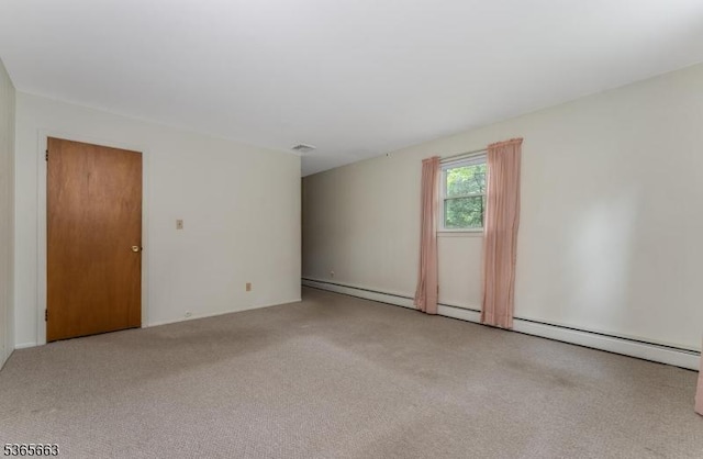 708 Carlene Dr, Bridgewater Twp, NJ 08807 - carpeted spare room featuring a baseboard heating unit