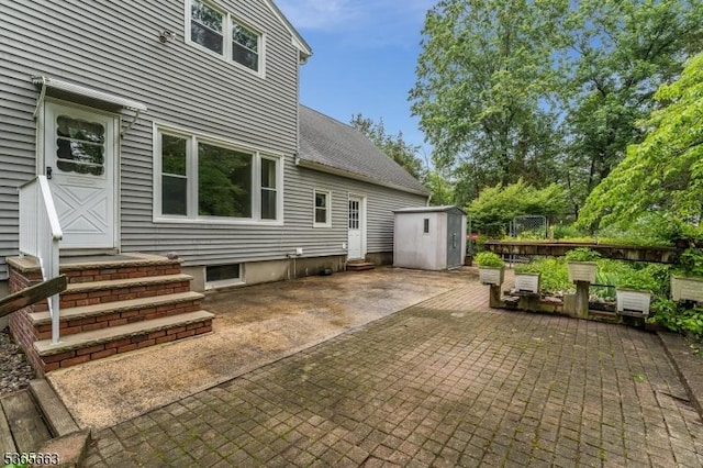 708 Carlene Dr, Bridgewater Twp, NJ 08807 - view of patio featuring a storage unit and entry steps