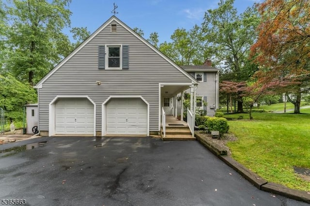 708 Carlene Dr, Bridgewater Twp, NJ 08807 - view of front of house featuring a front lawn, asphalt driveway, a garage, and a chimney