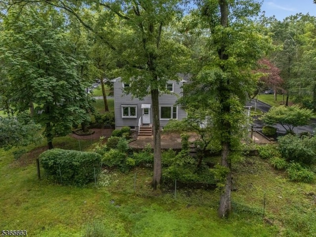 708 Carlene Dr, Bridgewater Twp, NJ 08807 - view of property hidden behind natural elements with entry steps