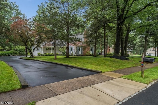 708 Carlene Dr, Bridgewater Twp, NJ 08807 - view of front facade with a front lawn