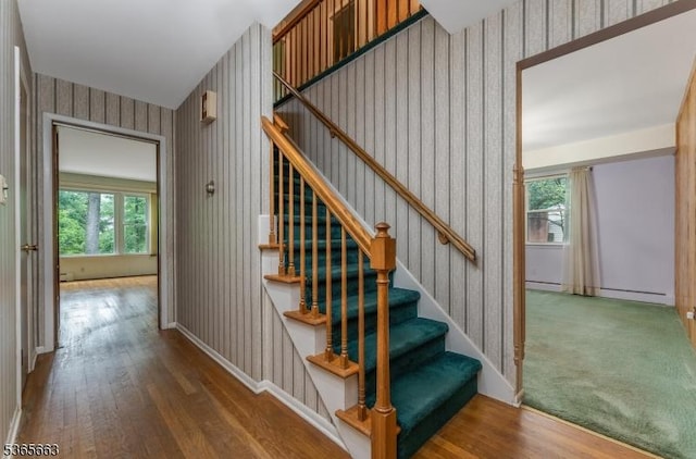 708 Carlene Dr, Bridgewater Twp, NJ 08807 - stairway featuring wallpapered walls, plenty of natural light, and wood finished floors