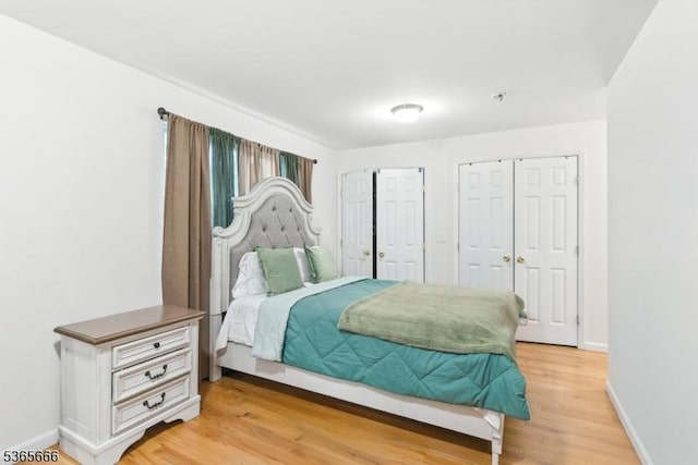 112-114 N 13th St, Newark City, NJ 07107 - bedroom featuring two closets and light wood-style floors