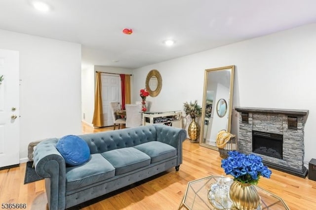 112-114 N 13th St, Newark City, NJ 07107 - living area featuring light wood finished floors, a fireplace, and recessed lighting