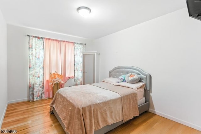 112-114 N 13th St, Newark City, NJ 07107 - bedroom with light wood-style floors and baseboards